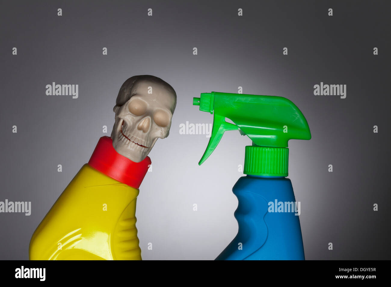 Imaginative confrontation between two toxic spray bottles Stock Photo