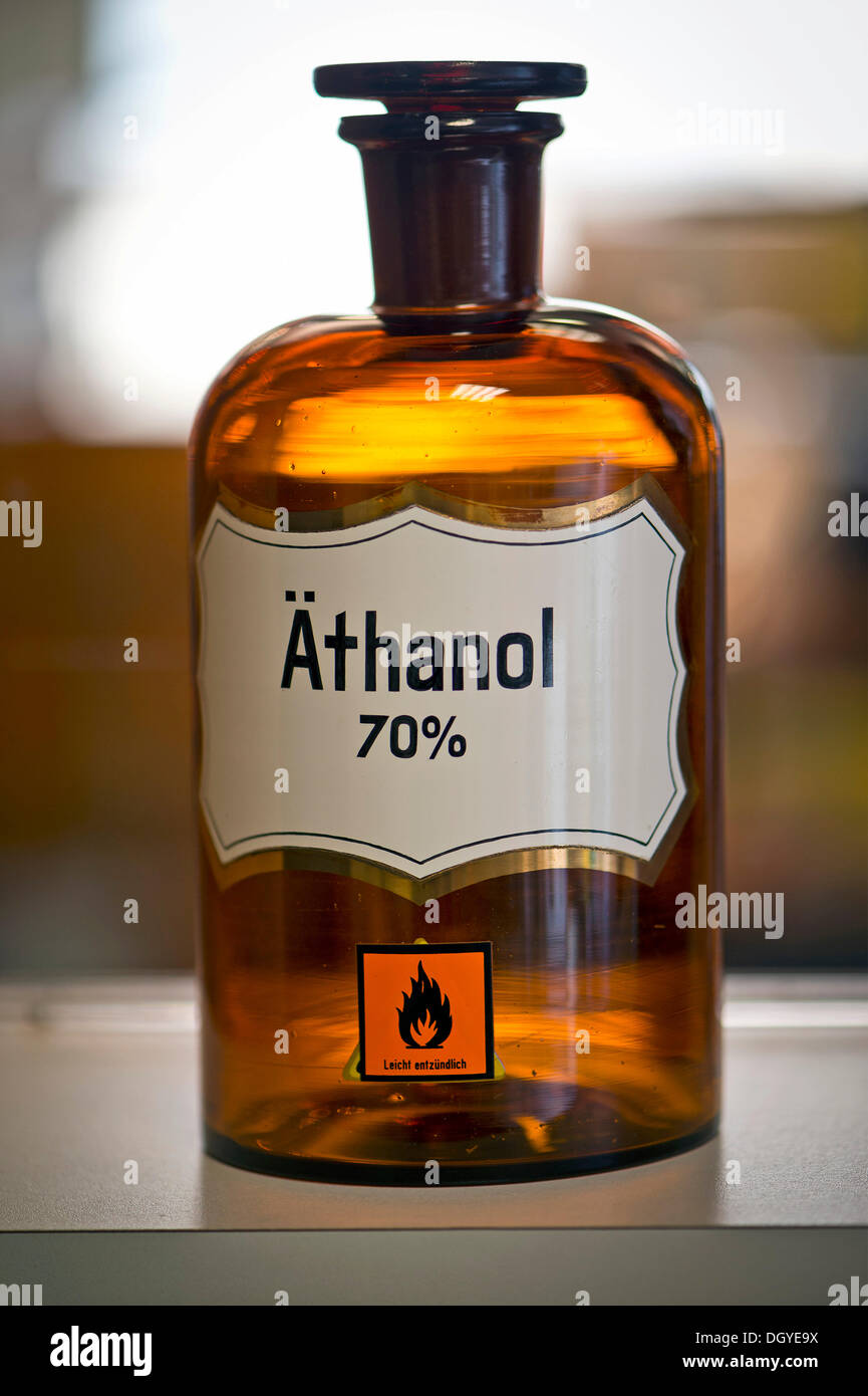 An old glass bottle for medicinal ingredients, labeled 'Aethanol 70%', German for 'ethanol 70%', pharmacy, Stuttgart Stock Photo