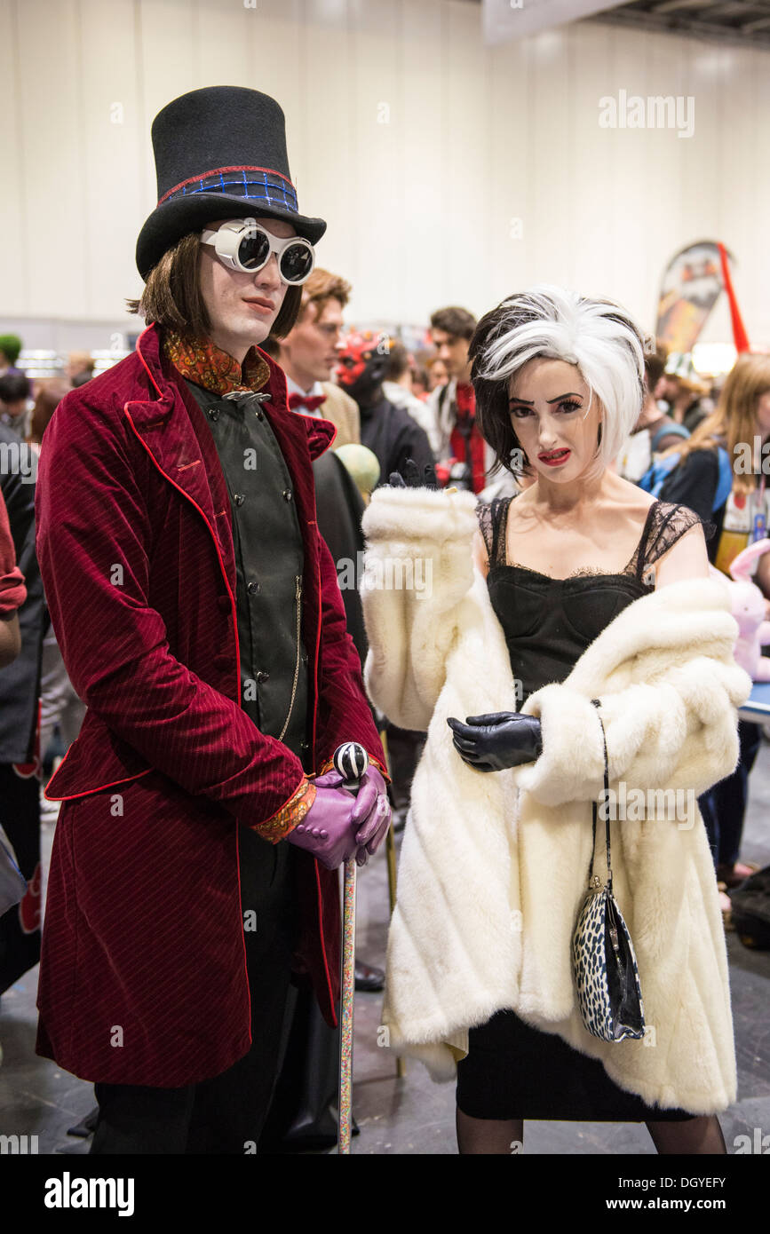 LONDON, UK - OCTOBER 26: Cosplayers dressed as Charlie from the chocolate Factory and Cruella de Vil from 101 Dalmatians Stock Photo