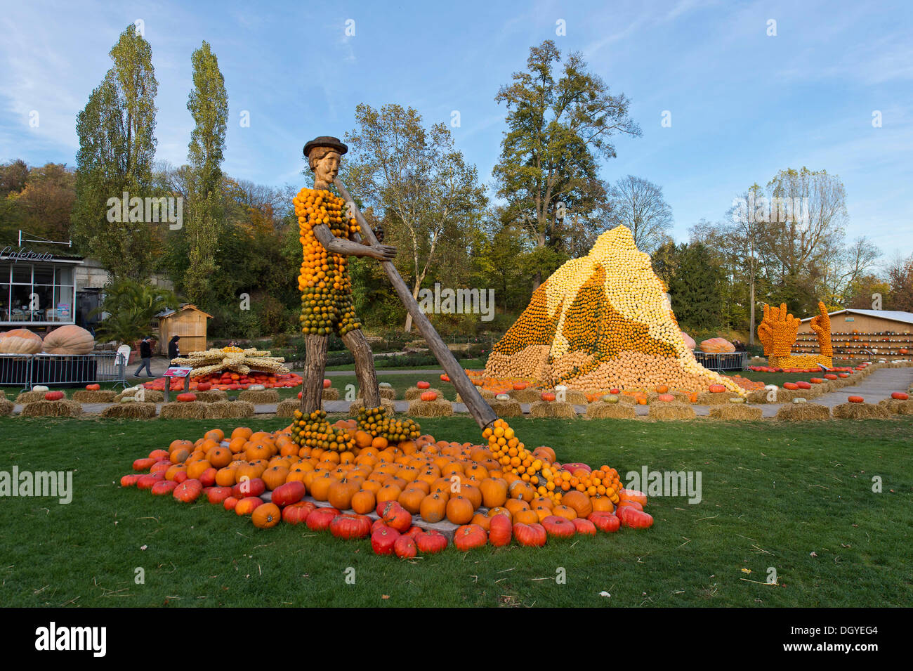 Figure of an alphorn player, hill made out of pumpkins, pumpkin exhibition, Ludwigsburg, Baden-Wuerttemberg Stock Photo