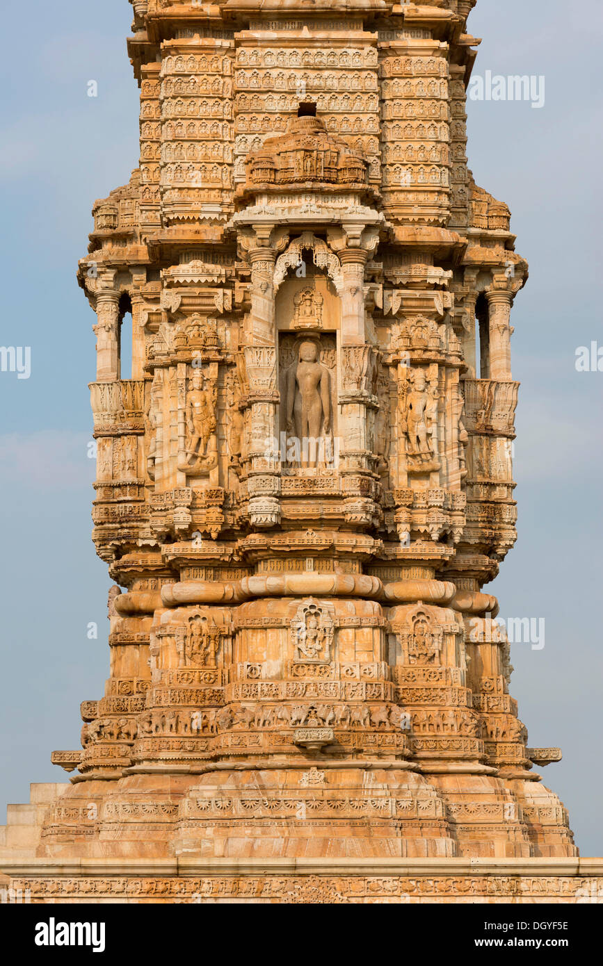 Decorative sculptures, Kirti Stambha, the victory tower of the Jains, built in honour of the first Jain Tirthankara Adinath Stock Photo