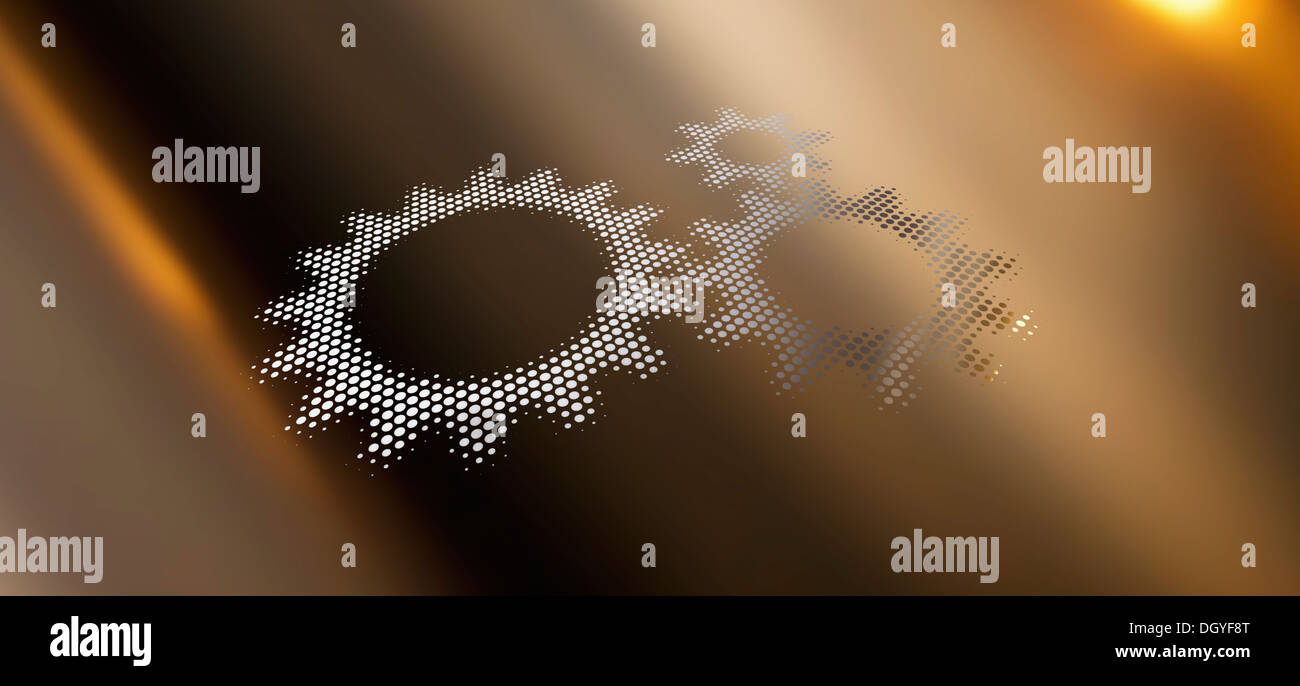 Three cogs against a background of colored light and shadow Stock Photo