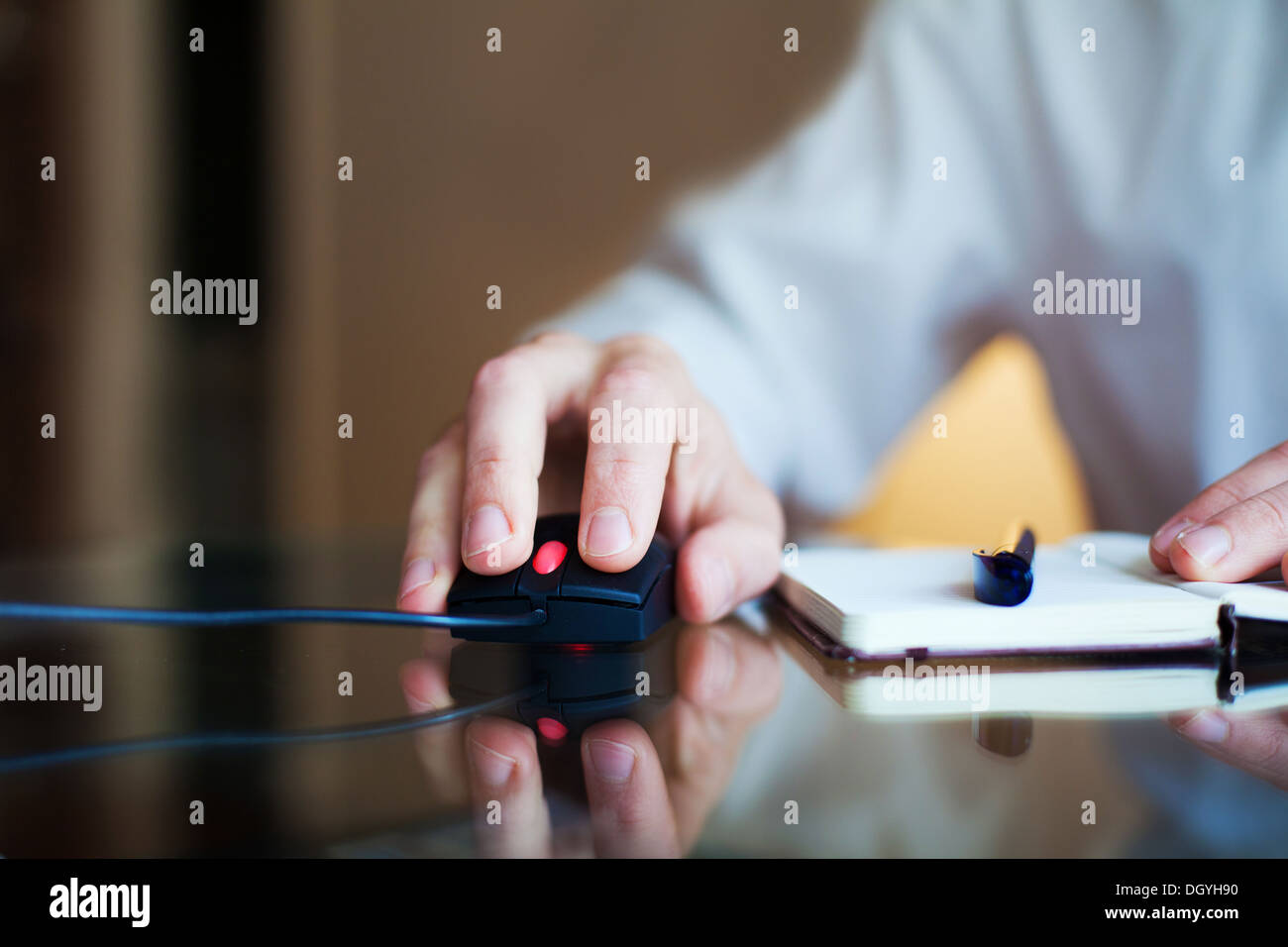 business man with computer mouse and notepad Stock Photo