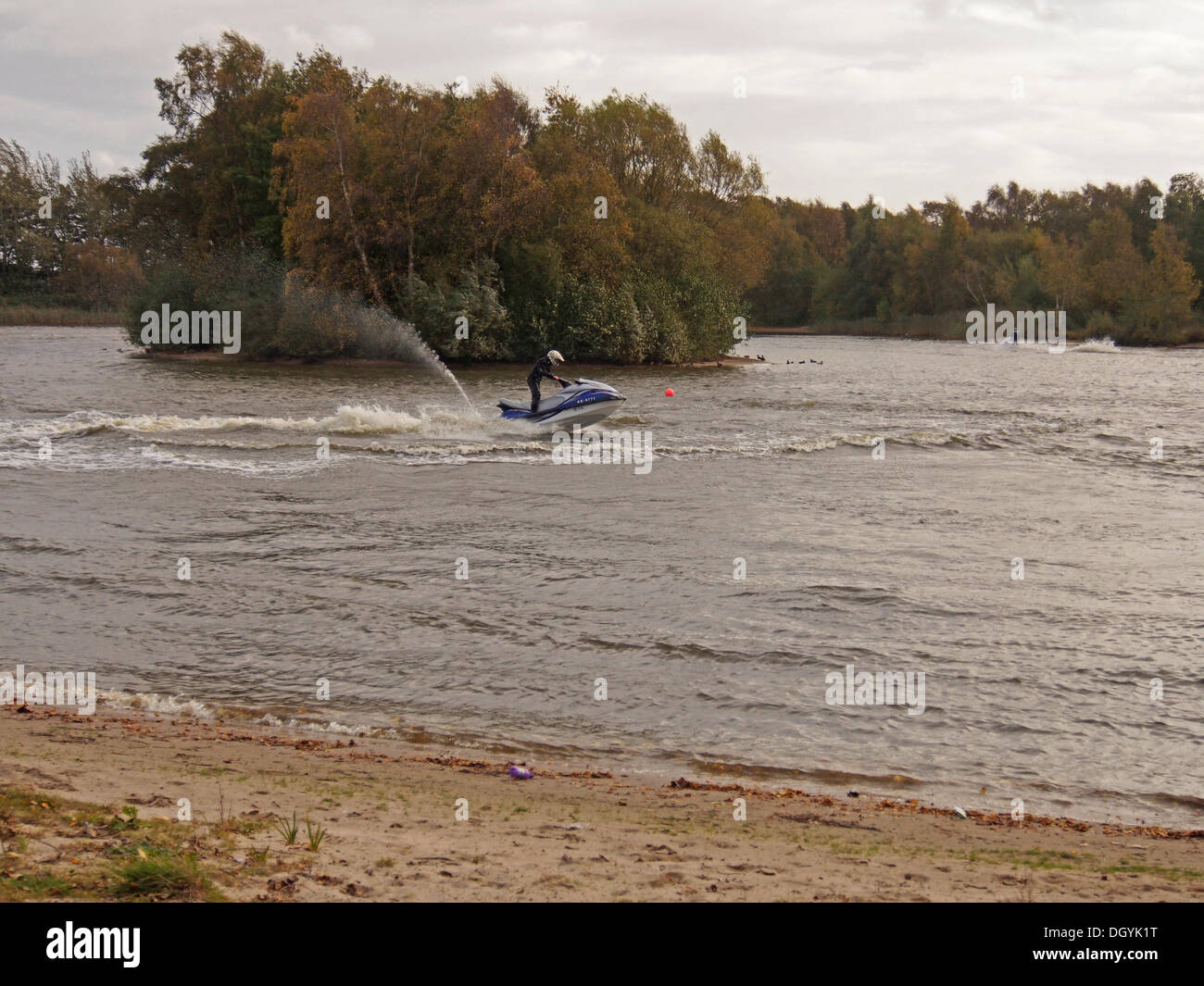 MERE BROW, TARLETON, LANCASHIRE, UK. 27th October 2013. Jet Skiers brave the 40mph winds as St Jude Storm approaches. © Sue Burton/Alamy Live News Stock Photo