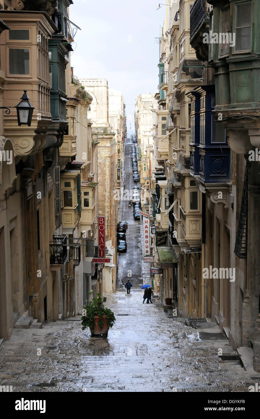 Alleyway with steps, St Lucia Street, old town of Valletta, Malta, Europe Stock Photo