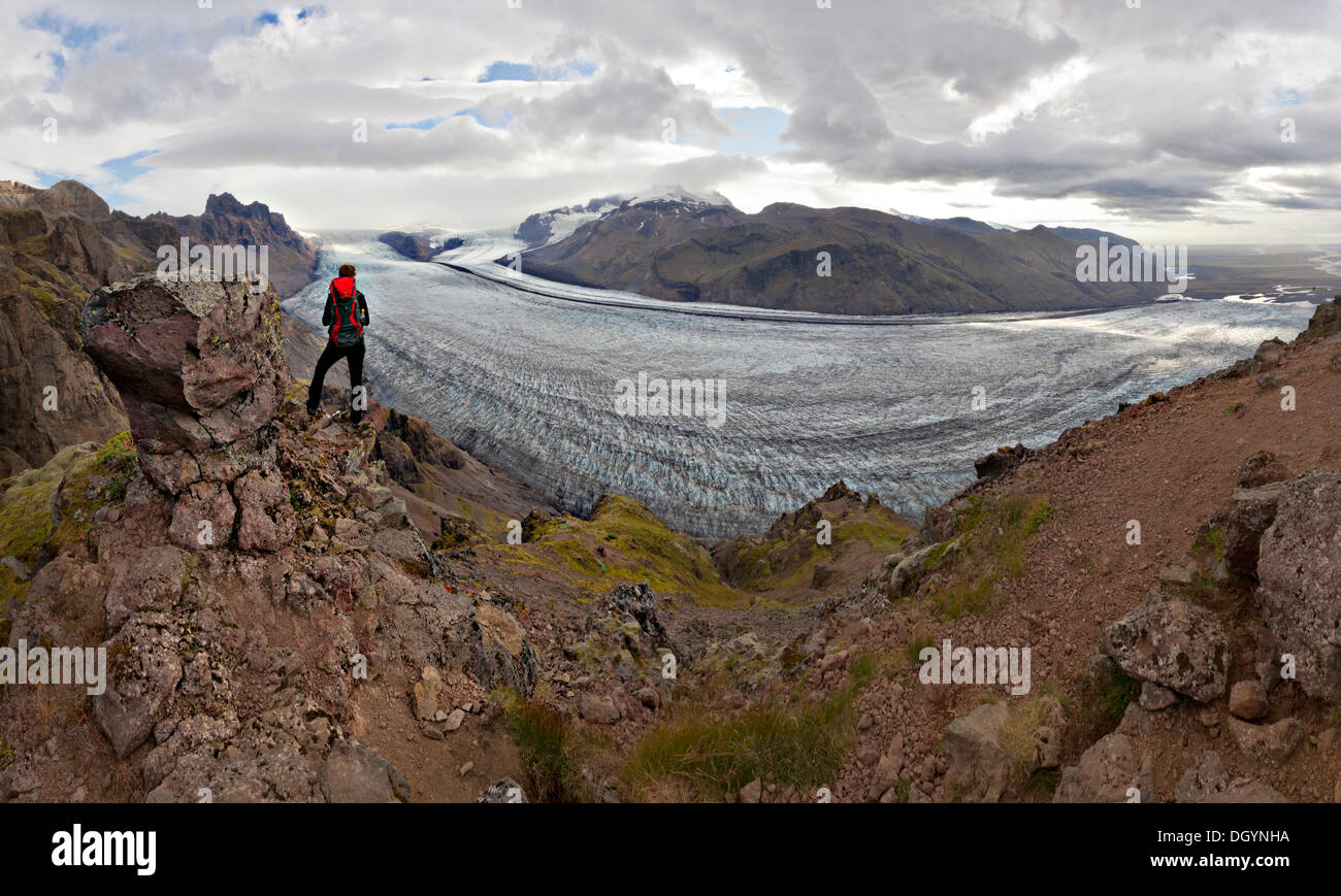 Mountaineer in front of Vatnajoekull glacier tongue, Skaftafell, South