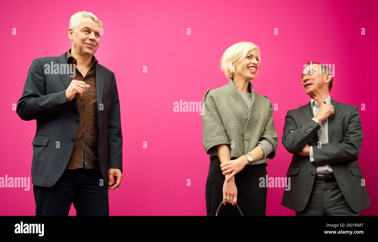 Munich, germany. 28th Oct, 2013. Katja Eichinger, curator of the German Cinematheque, Peter Maenz (L), and Cinematheque director Rainer Rother (R) pose for the cameras at a press conference on the exhibition 'Bernd Eichinger - .Alles Kino' in Munich, germany, 28 October 2013. The exhibition runs from 29 October 2013 until 02 February 2014. Photo: Inga Kjer/dpa/Alamy Live News Stock Photo