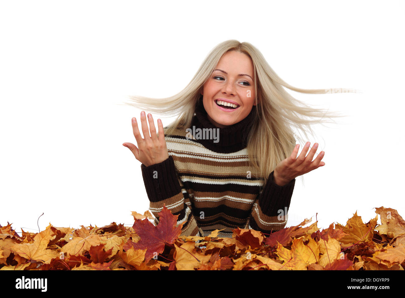 studio portrait of autumn woman in yellow leaves Stock Photo - Alamy