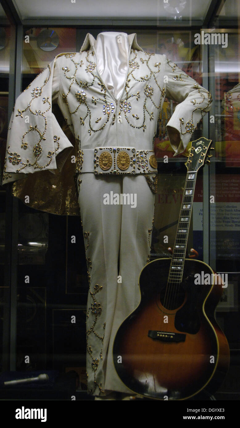 Tennessee. Memphis. Graceland Mansion to Elvis Presley (1935-1977). Inside. Suit and guitar. USA. Stock Photo