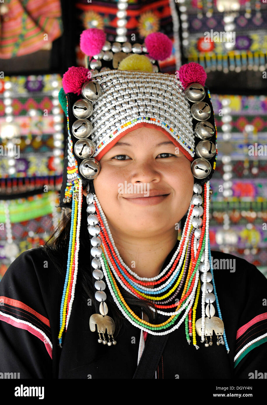 Woman of the Akha hill tribe wearing a traditional headdress, Chiang ...