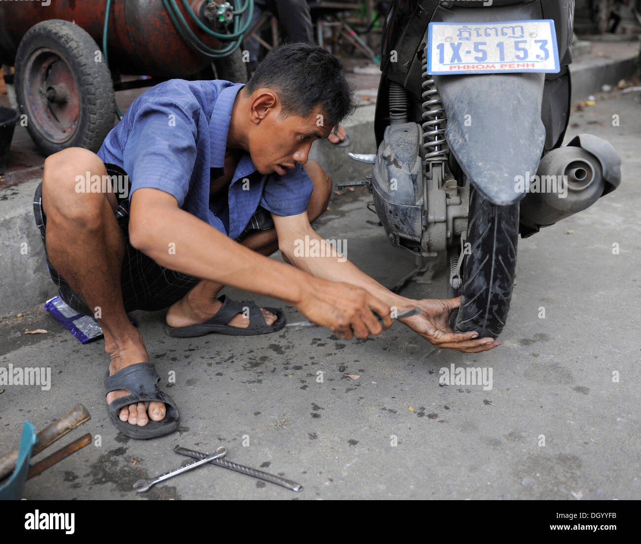 Motorbike flat tire hi-res stock photography and images - Alamy