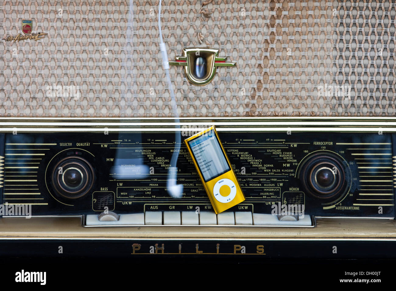 Contrast between an iPod and an old radio Stock Photo