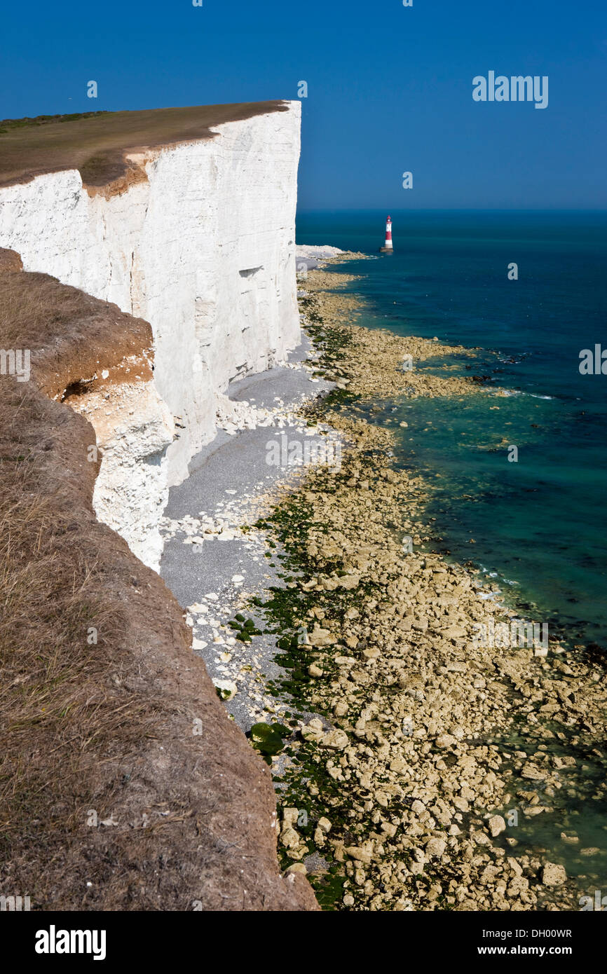 Lighthouse and white limestone cliffs at Beachy Head, Seven Sisters Country Park, East Sussex, England, United Kingdom Stock Photo