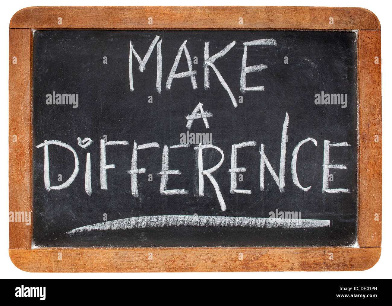 make a difference -motivational phrase - white chalk handwriting on a vintage slate blackboard Stock Photo
