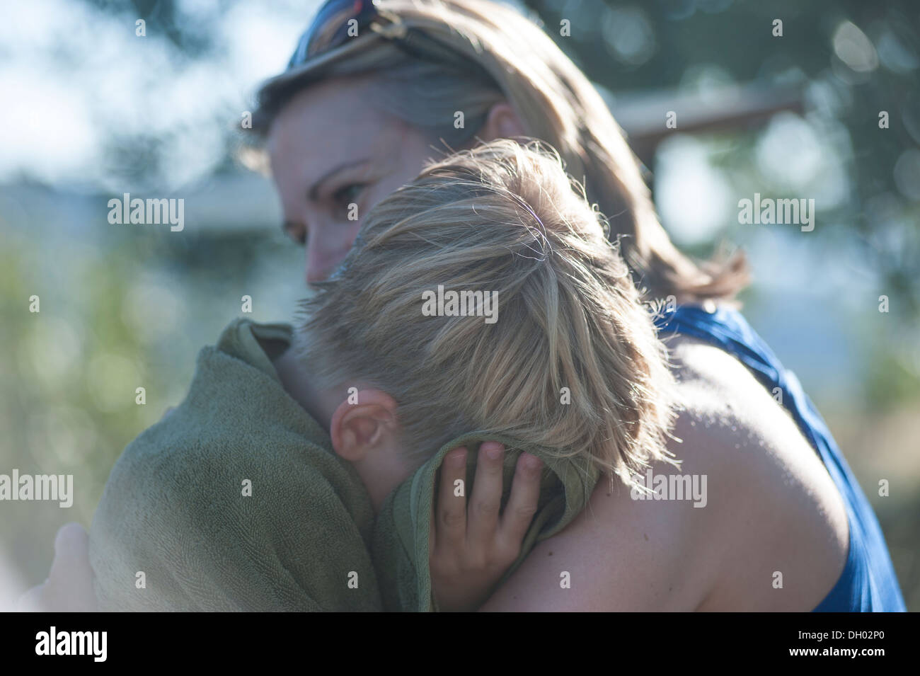 Mother crying boy hug hi-res stock photography and images - Alamy