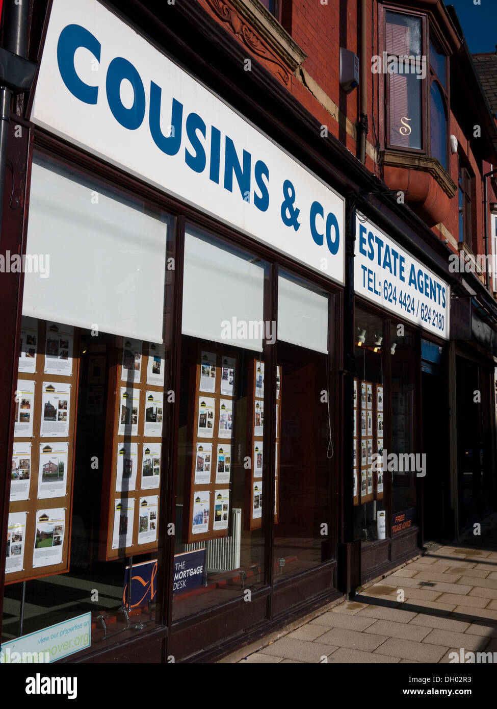 Cousins & Co Estate Agents. Oldham, Greater Manchester, UK Stock Photo