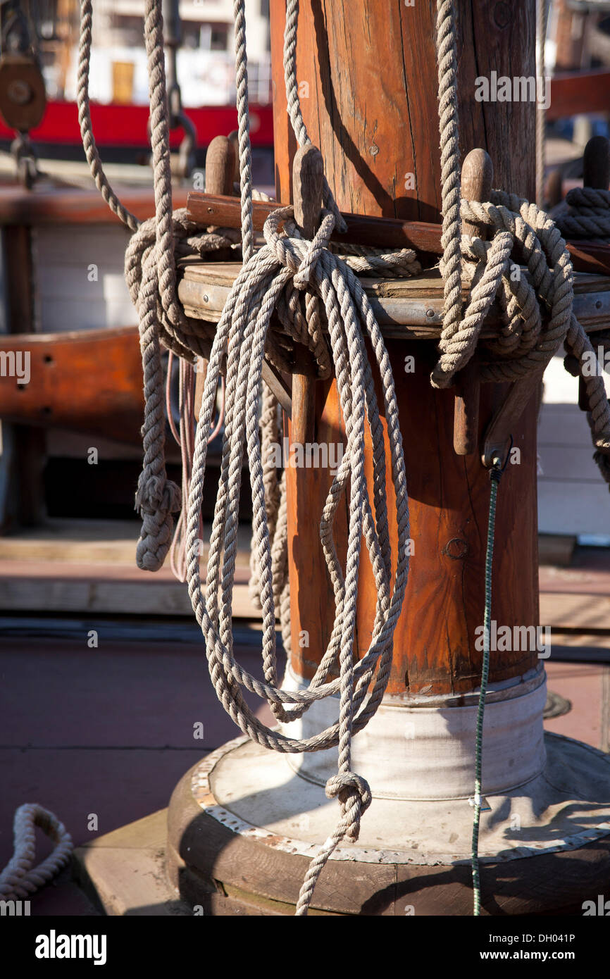 Detail view of ropes of a small sailing ship in the harbour of ...