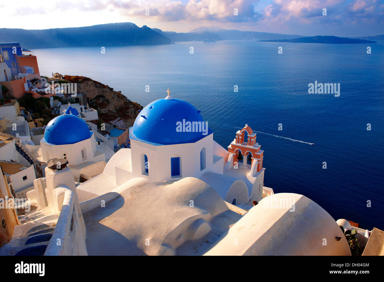 Blue domed Byzantine Orthodox churches, Oia, Ia, Santorini, Cyclades Islands, Greece, Europe Stock Photo