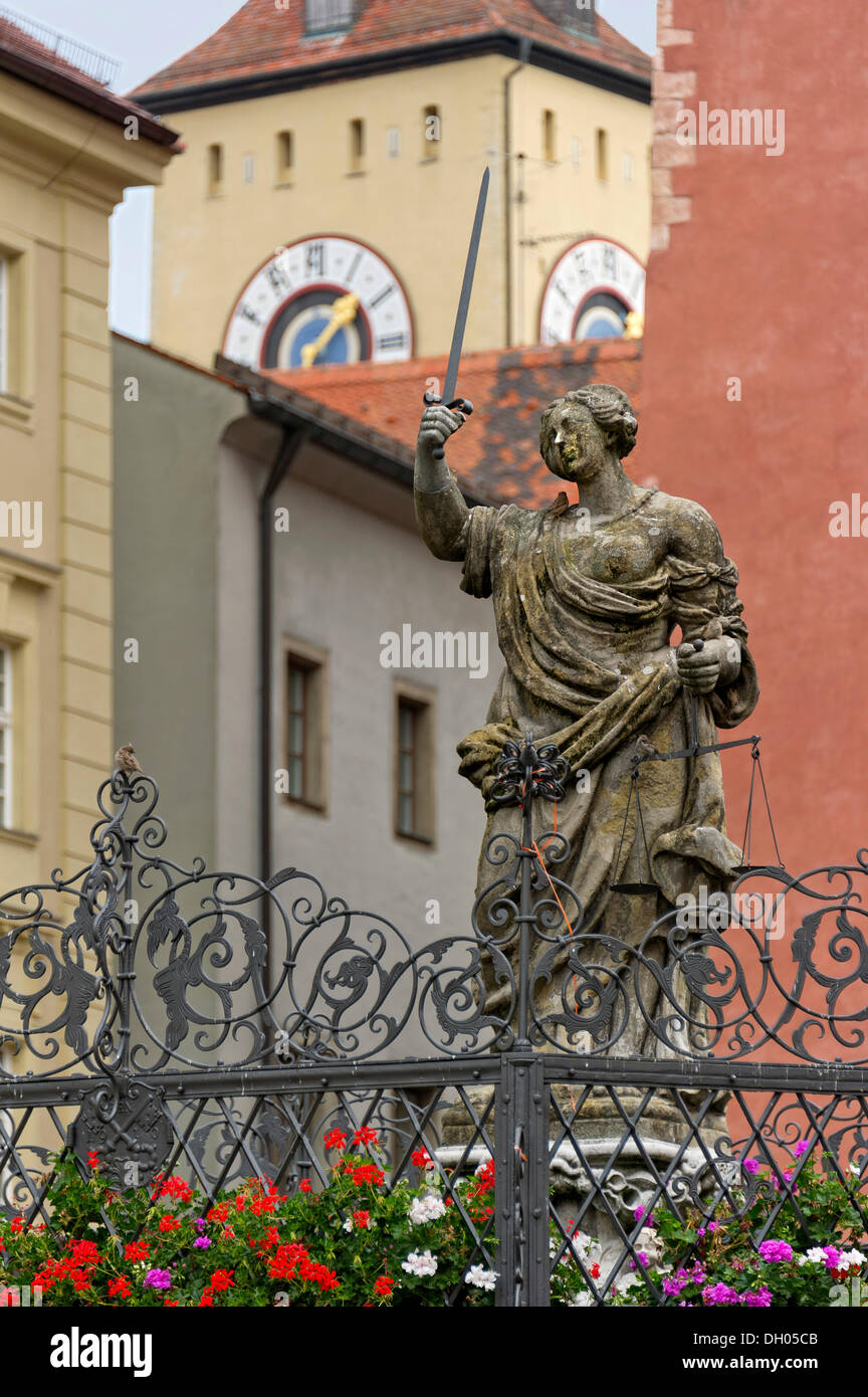 Statue of Lady Justice, Fountain of Justice, Haidplatz square, tower of the town hall, old town of Regensburg, Upper Palatinate Stock Photo