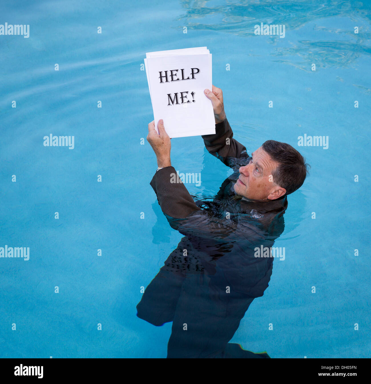 Drowning in debt hi-res stock photography and images - Alamy
