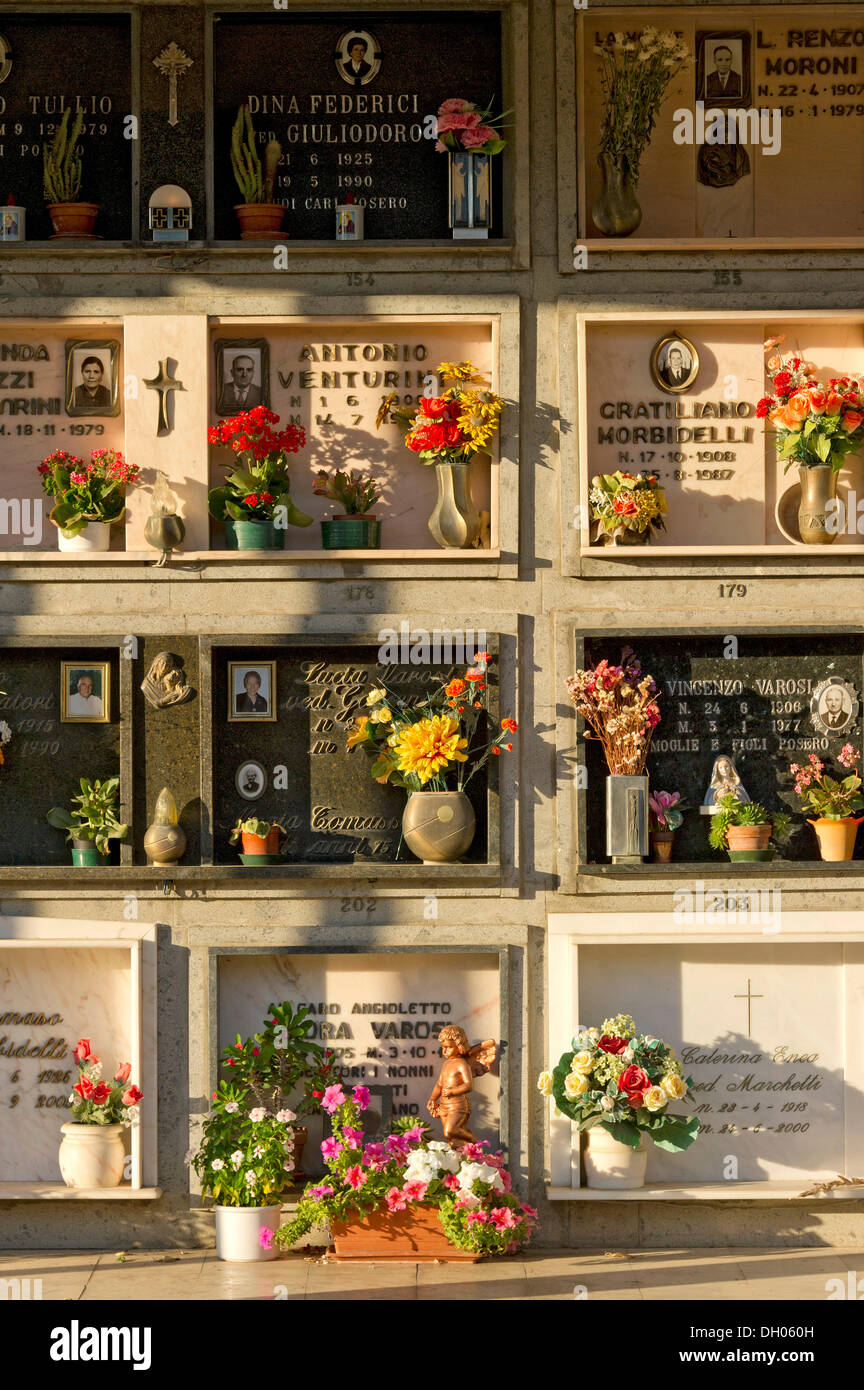 Graves in the columbarium for above ground burials, grave niches with plaques, graveyard, Bassano Romano, Lazio, Italy Stock Photo