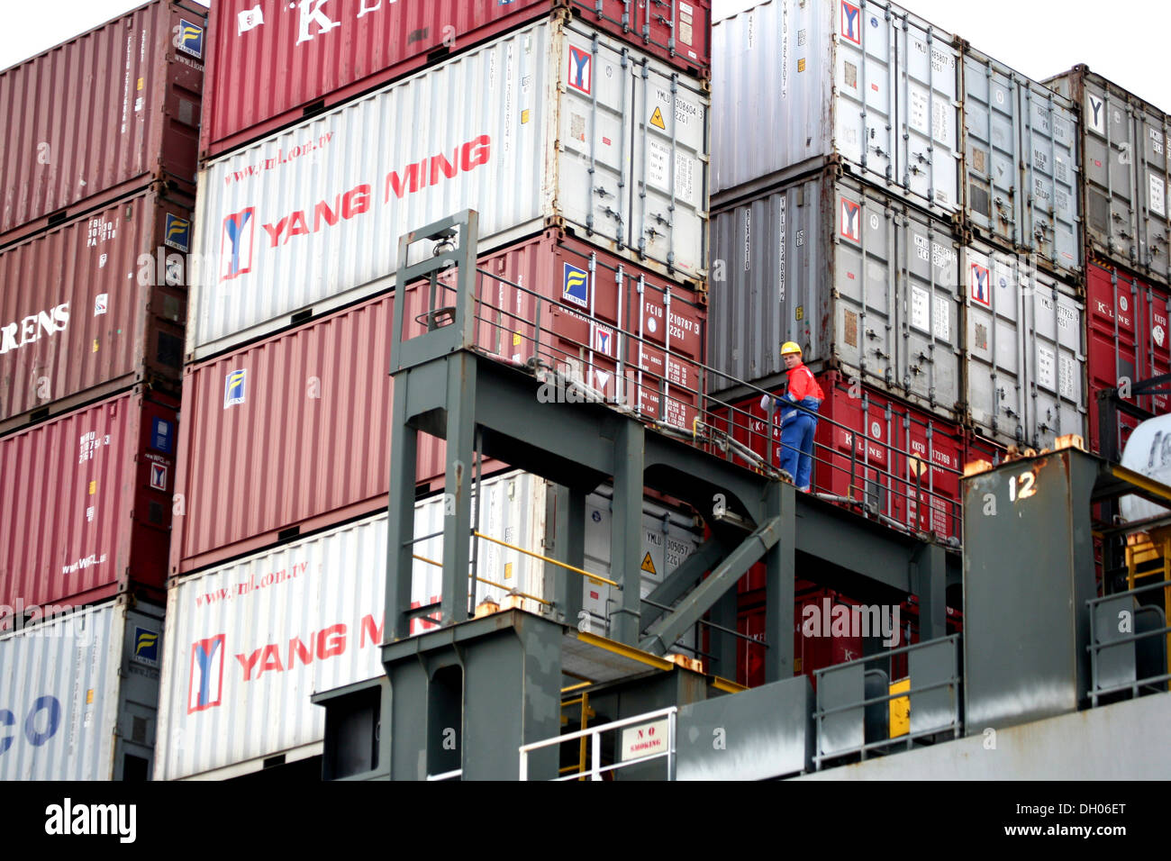 Containers being loaded on a ship in the port of Hamburg Stock Photo ...