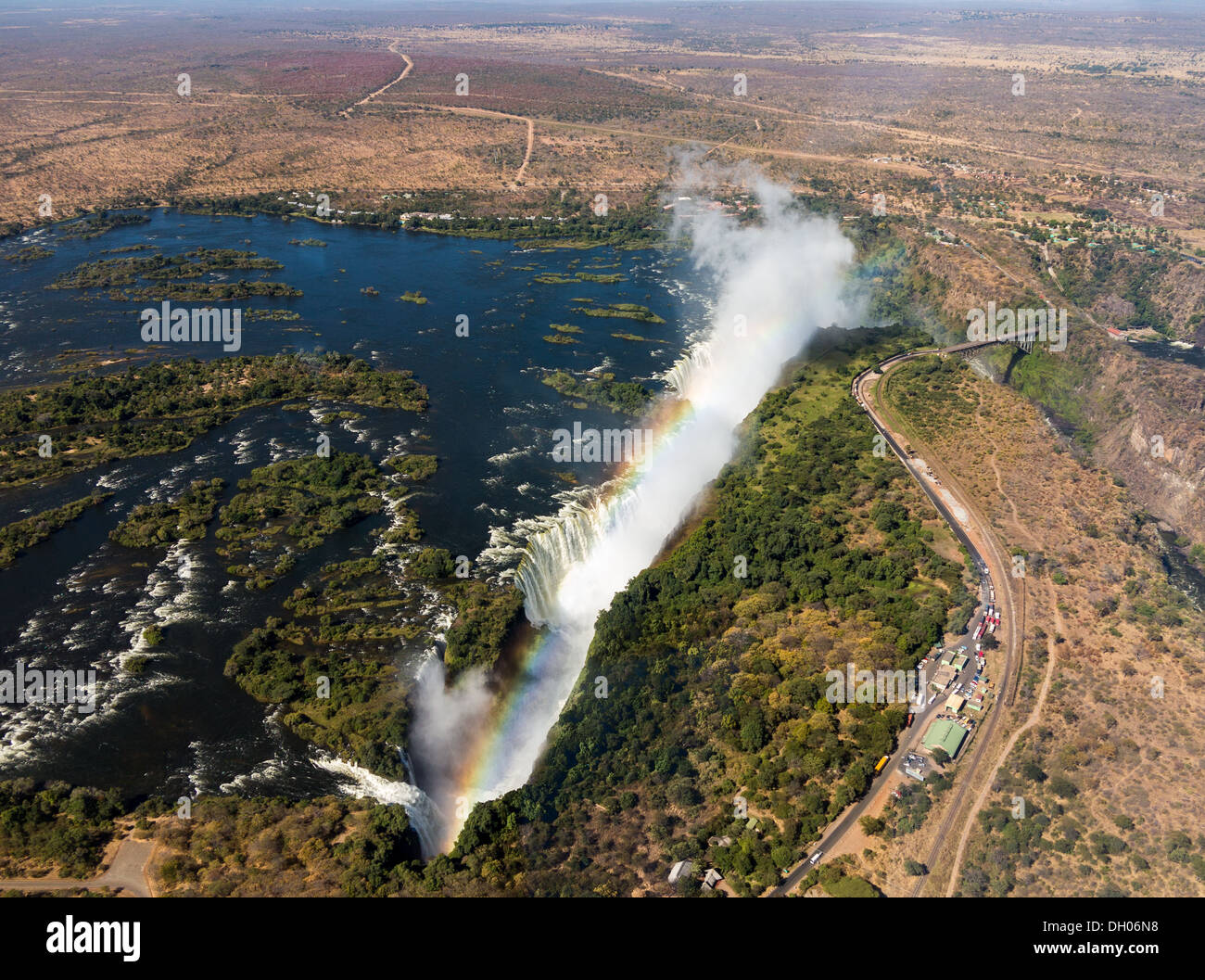 Victoria Falls on the Zambezi River, aerial view with rainbow Stock Photo