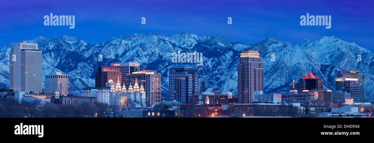 Panoramic view of Salt Lake City at twilight with the Wasatch Mountains beyond, Utah USA Stock Photo