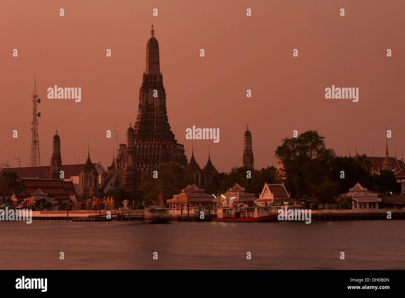 Wat Arun or 'Temple of Dawn' on the Chao Phraya River at sunrise, Thonburi, Bangkok, Bangkok, Thailand Stock Photo