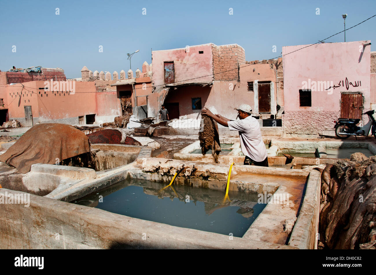 Tanneries ( Tannery )  Leather and skin processing outdoor tanning vats north of Medina district Marrakech  Morocco North Africa Stock Photo