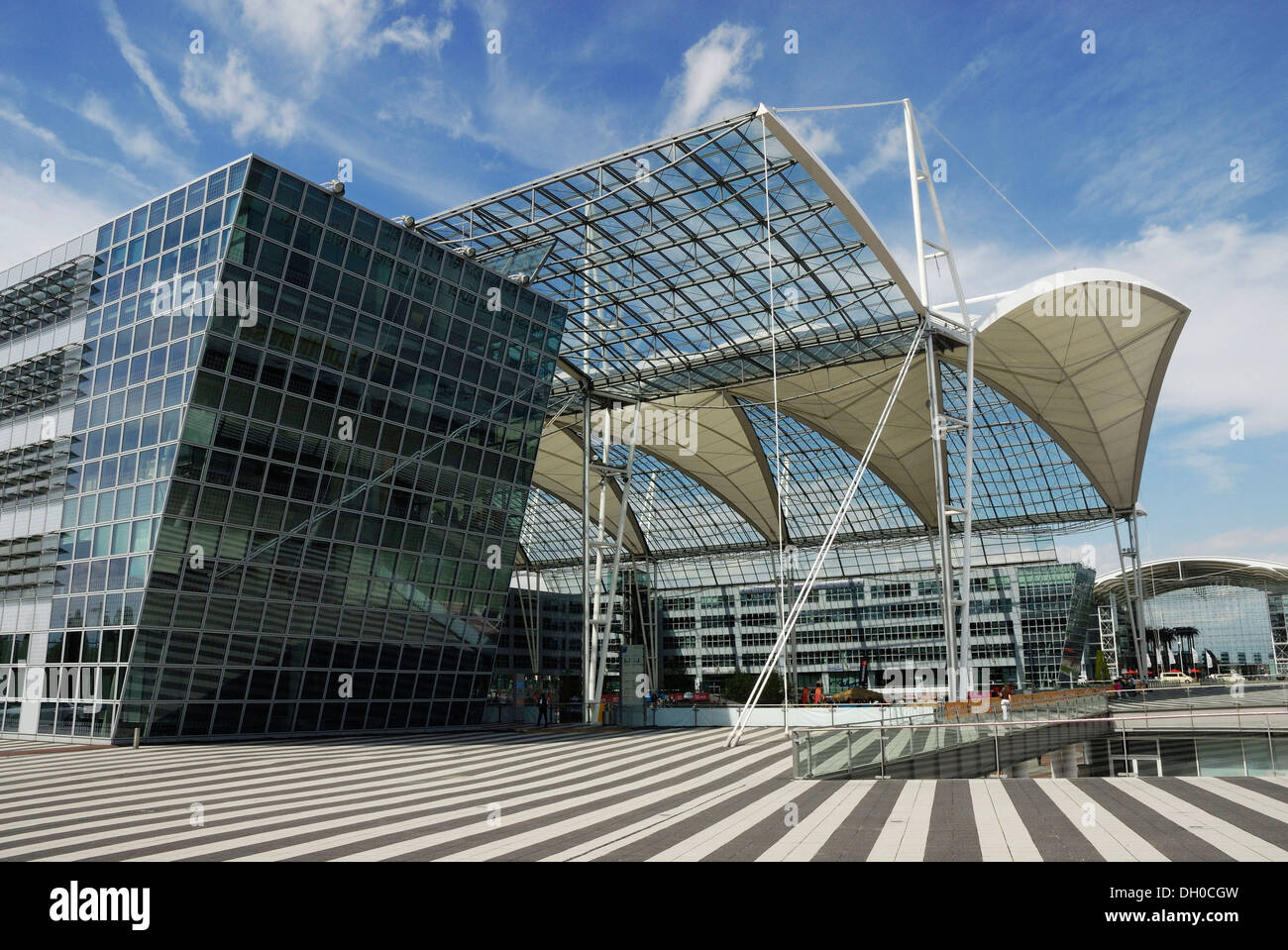 Transparent roof and a modern office building, Terminal 2, Munich Airport, Bavaria Stock Photo