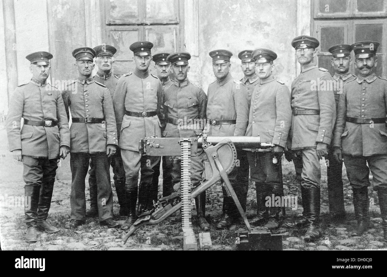 Prussian soldiers wearing full dress uniforms standing behind a water-cooled machine gun, before the outbreak of World War I Stock Photo