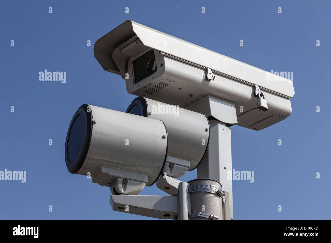 Stop light traffic camera with mounted strobe lights. Stock Photo