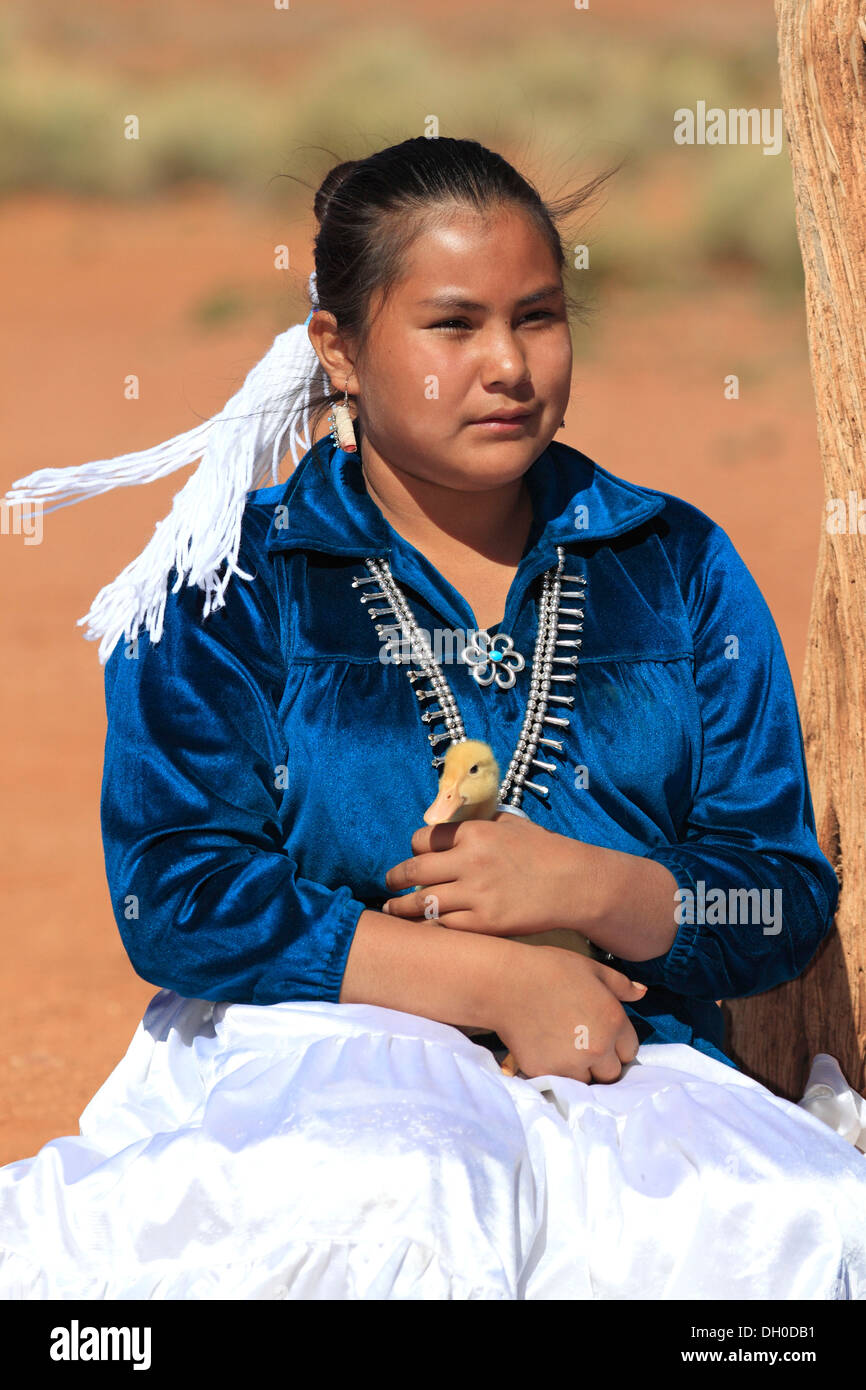Navajo Indian woman holding a duckling, Monument Valley, Utah, United States Stock Photo