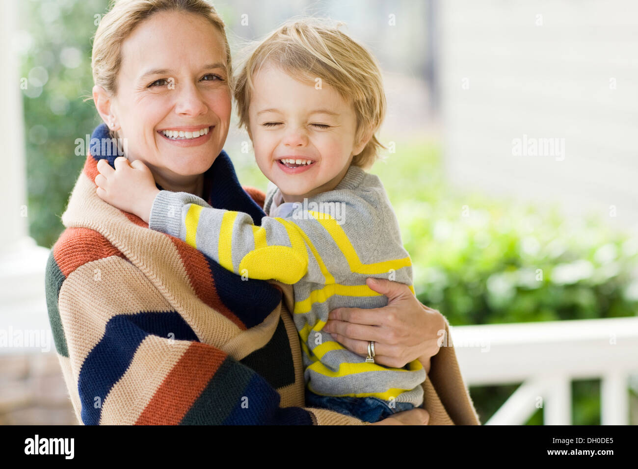 Caucasian mother holding son Stock Photo