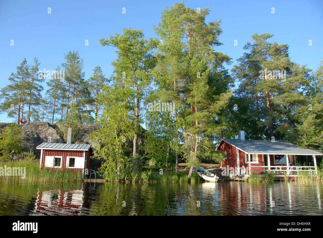 Summer house with a sauna cabin on an island in Lake Saimaa near Savonlinna, Finland, Europe Stock Photo