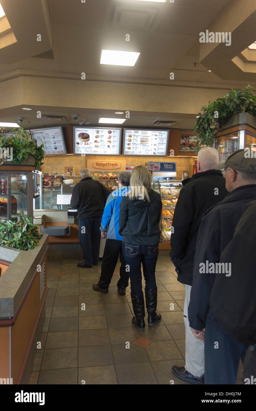 line at Tim Hortons cafe, New Westminster, BC, Canada Stock Photo