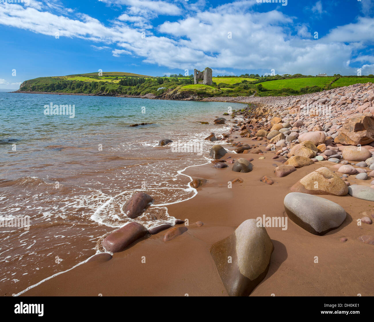 County Kerry, Ireland: Shoreline of Dingle Bay with Minard Castle in the distance on the Dingle Peninsula Stock Photo