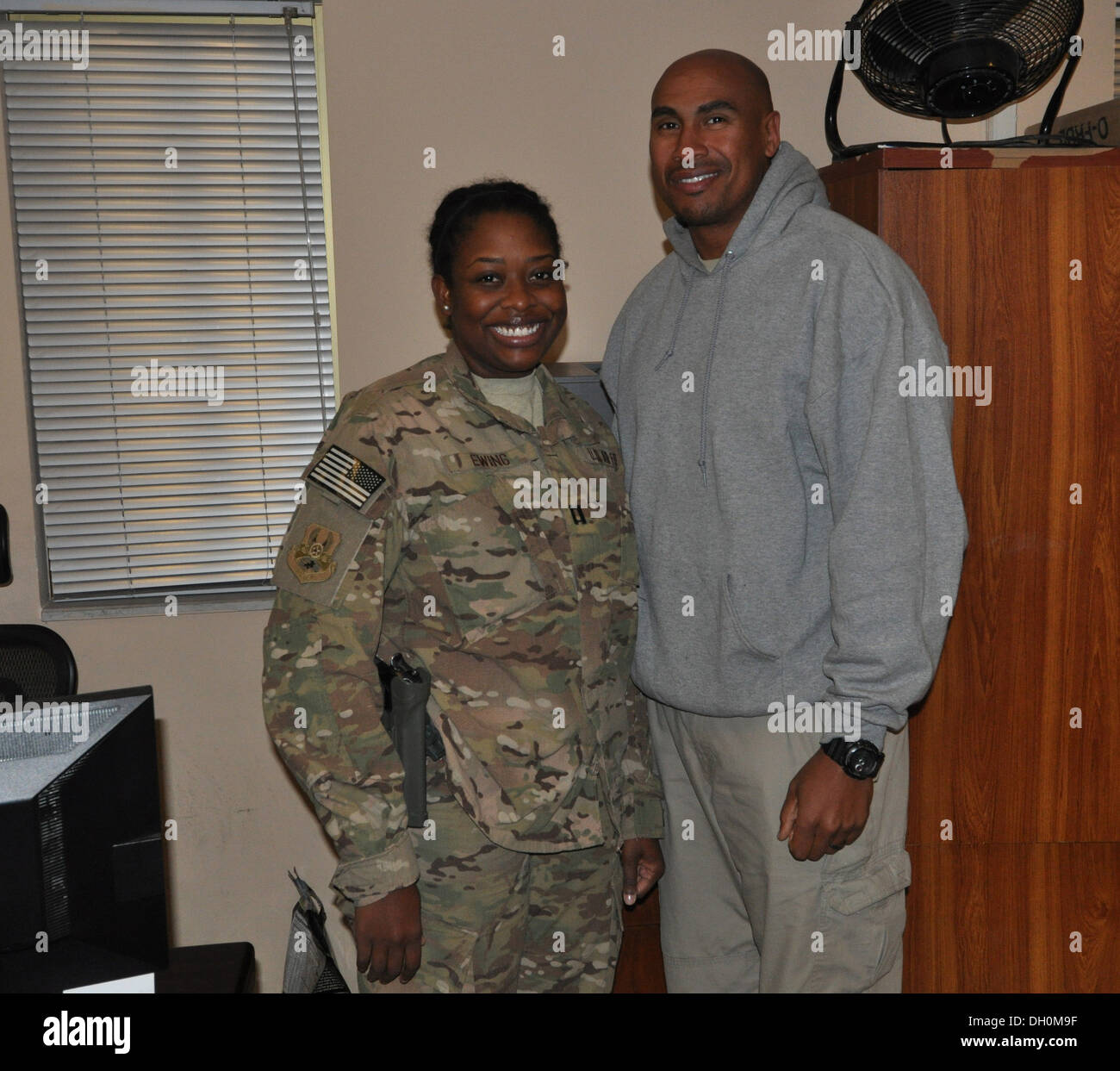 Capt. Tricia Ewing, deputy director, financial management and comptroller for Air Force Central Command Forward Staff, got the opportunity to reunite with her husband, Reggie, while they're in the area of responsibility for a short time during their one-y Stock Photo
