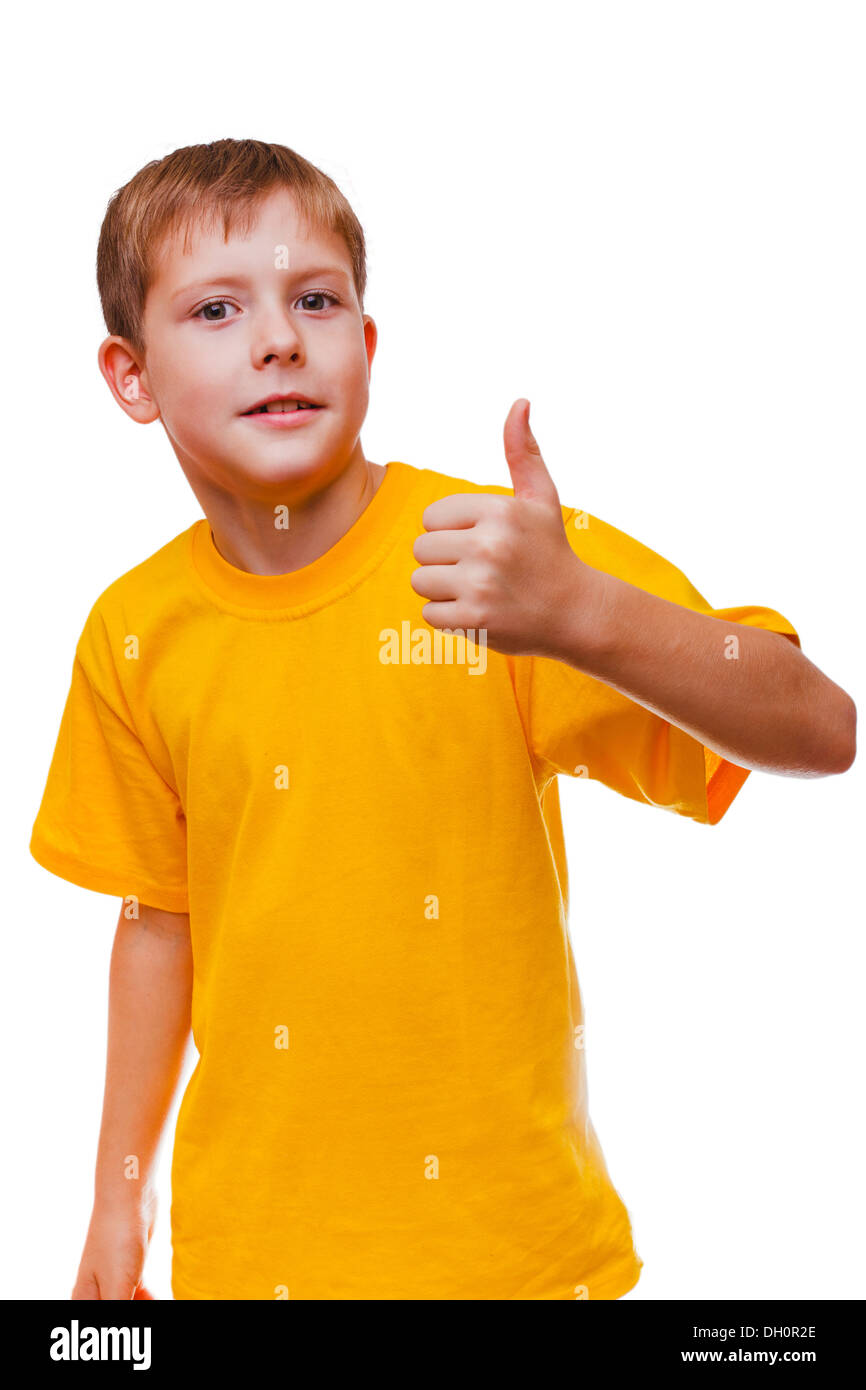 blond boy kid in yellow shirt holding a thumbs-up, showing the sign yes on a white background Stock Photo