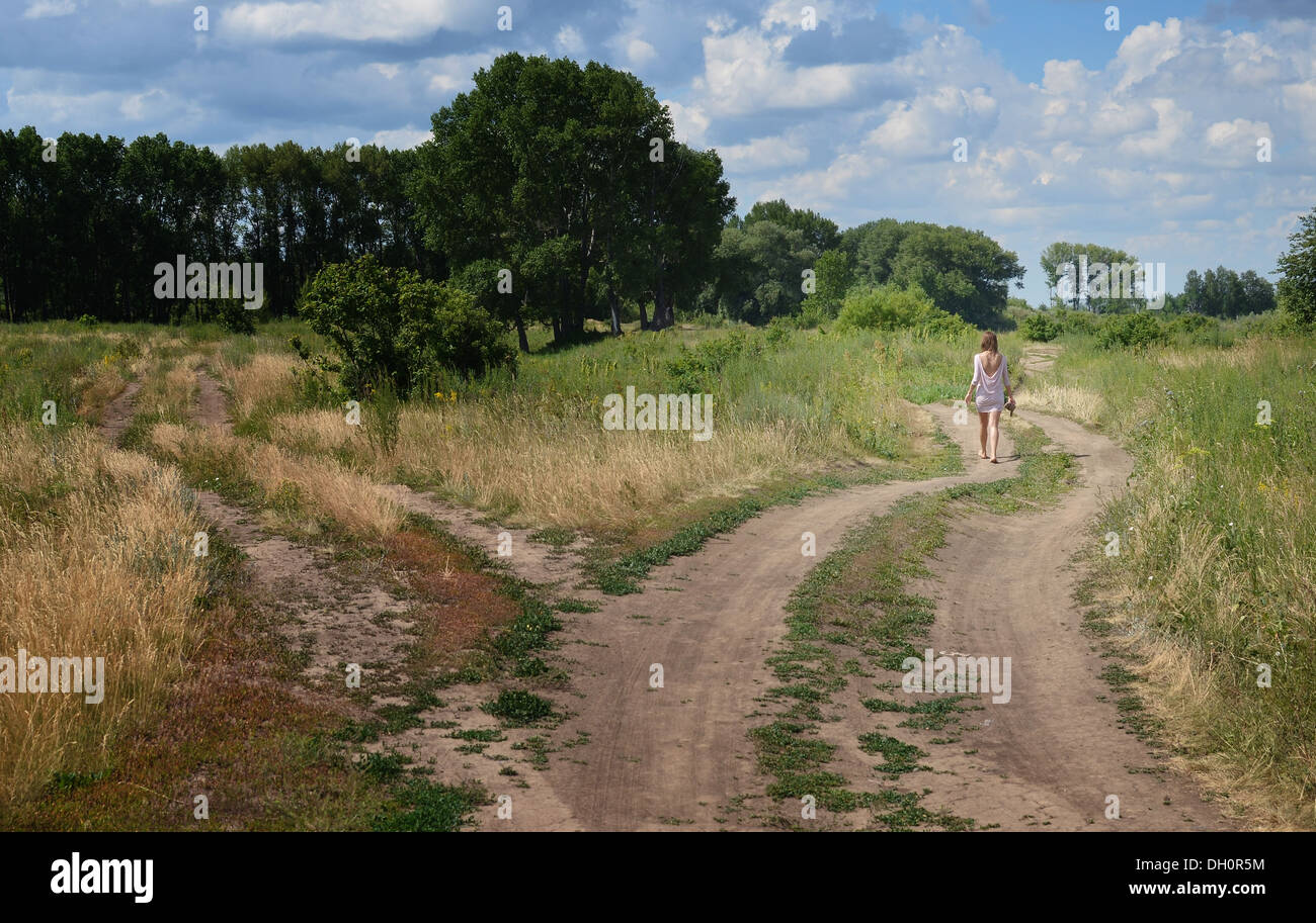 Woman walking hi-res stock photography and images - Alamy