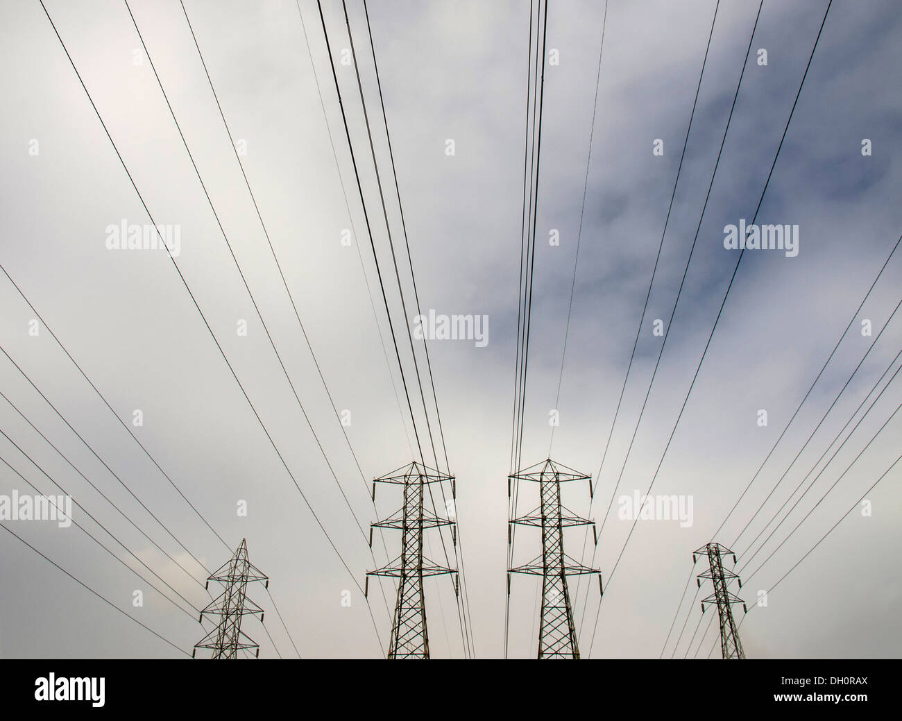 Power lines backed by a stormy sky Stock Photo - Alamy