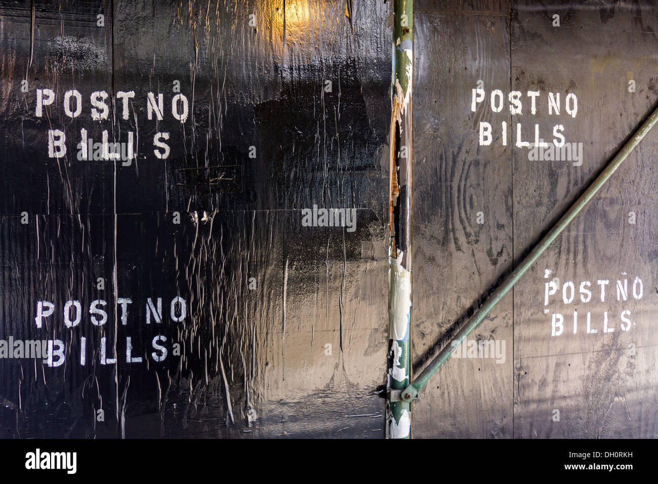 Post No Bills is posted on a construction shed in the Lower East Side neighborhood of New York Stock Photo
