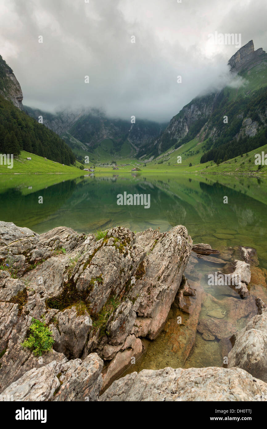 Cloudy mood over Lake Seealpsee in Alpstein, Appenzellerland, Switzerland, Europe Stock Photo