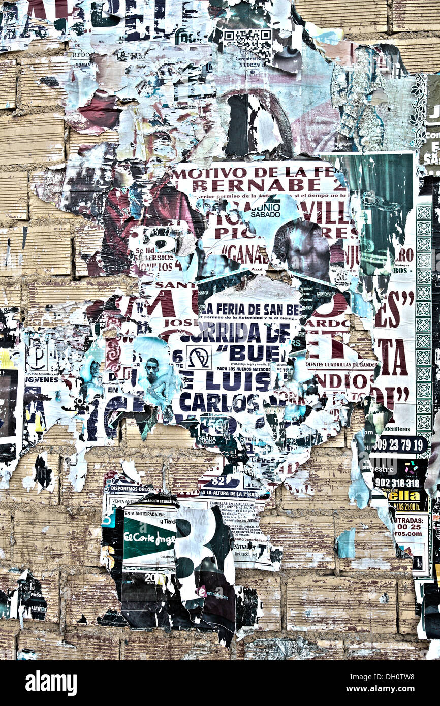 Ripped old posters on brick wall Stock Photo Alamy