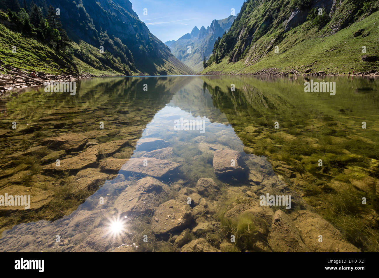 Lake Faehlensee, sun being reflected in the lake, Alpstein, Appenzell, Switzerland, Europe Stock Photo