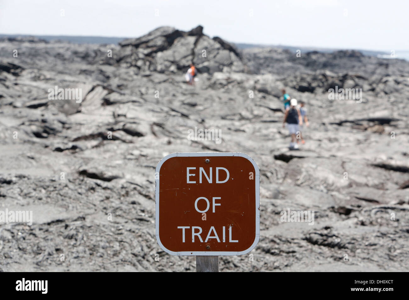 Sign 'End of Trail', hikers at the end of the trail, lava field, East Rift Zone, Kilauea volcano, Big Island, Hawaii, USA Stock Photo