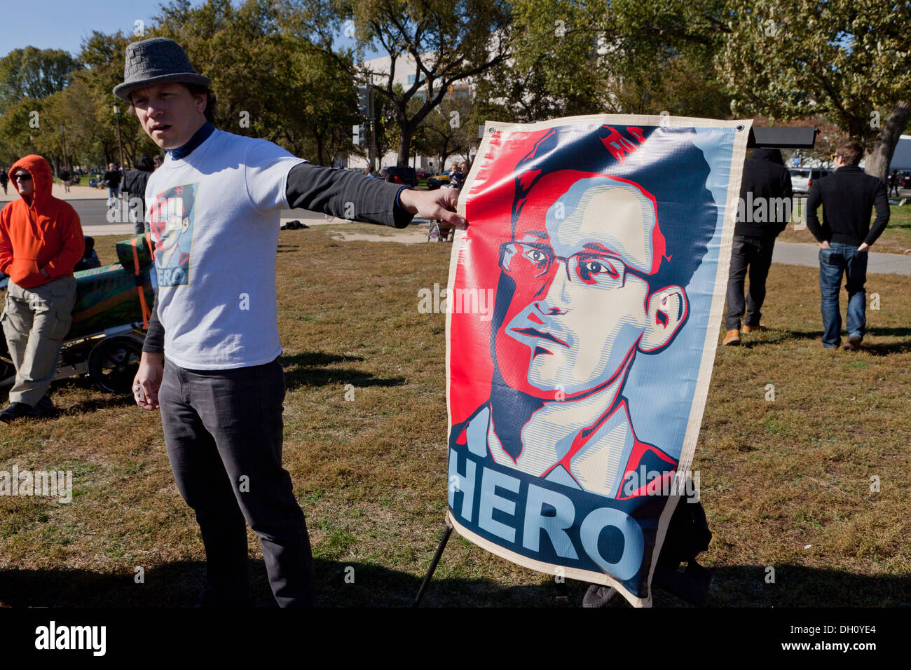 Man holding Edward Snowden Hero sign - Washington, DC USA Stock Photo
