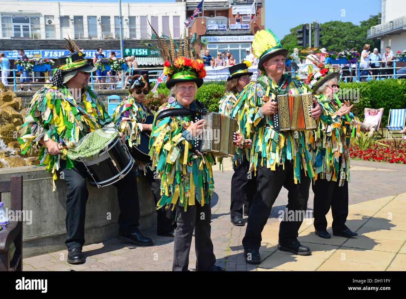 Morris dancing troupe performing on seafront promenade, Skegness, Lincolnshire, England, United Kingdom Stock Photo