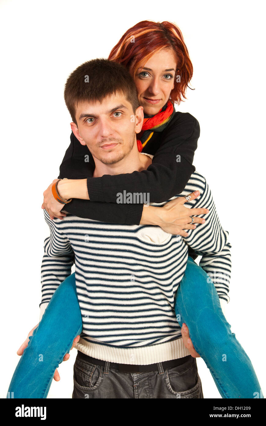 Man offering piggy back ride to woman isolated on white background Stock Photo